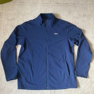 Patagonia Mens Adze jacket in blue. With small quickbooks embroidered branding